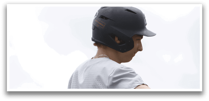 A baseball player wearing a green number 11 jersey. Description generated by AI