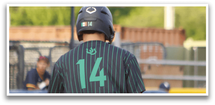 A baseball player wearing a green and black striped uniform. Description generated by AI