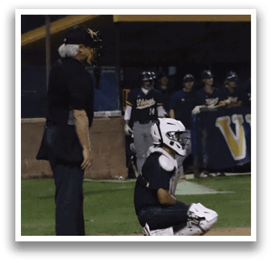 A baseball game is taking place with a batter and a catcher. Description generated by AI