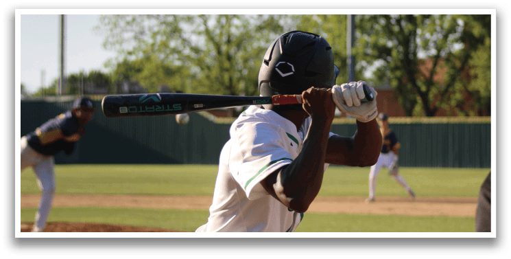 A baseball player is swinging a bat. Description generated by AI