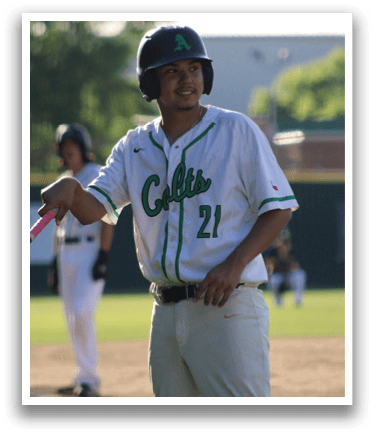 A baseball player wearing a white jersey with the number 22 on it. Description generated by AI