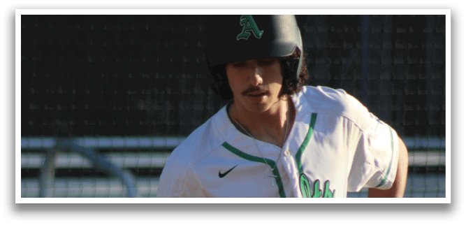 A baseball player wearing a helmet and a white jersey. Description generated by AI