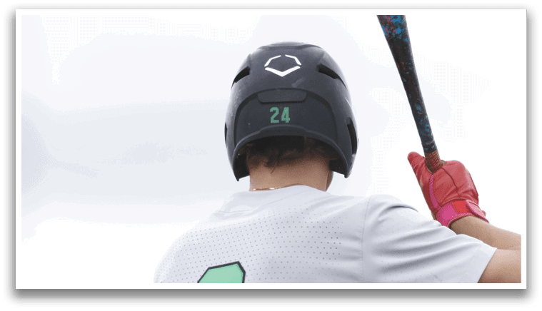 A baseball player wearing a green and white jersey with the number 9 on it. Description generated by AI