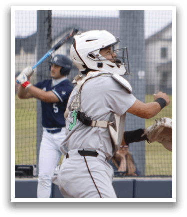 A baseball player sliding into home plate. Description generated by AI