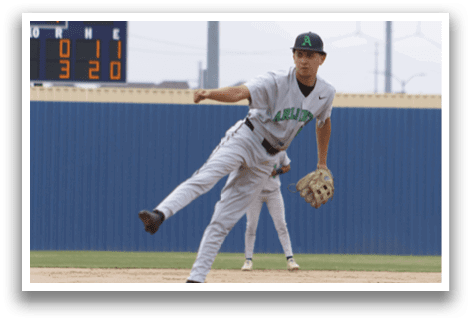 A baseball player in a white uniform is throwing a ball. Description generated by AI