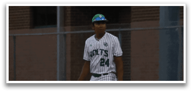 A baseball player standing on the field with a glove on his hand. Description generated by AI