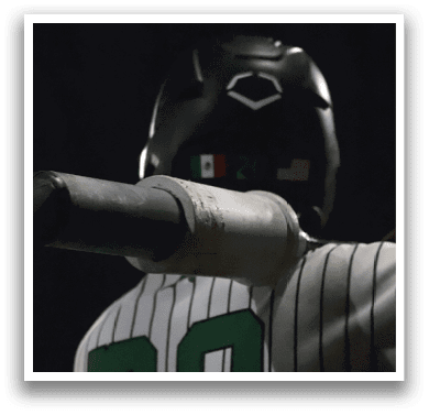 A baseball player wearing a green and white jersey. Description generated by AI