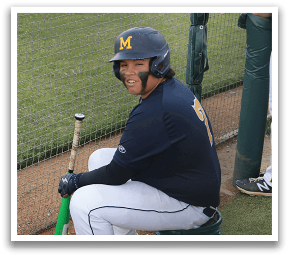 A baseball player wearing a blue shirt and a helmet. Description generated by AI
