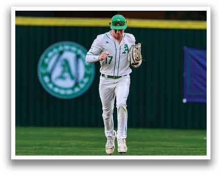 A baseball player running on the field. Description generated by AI