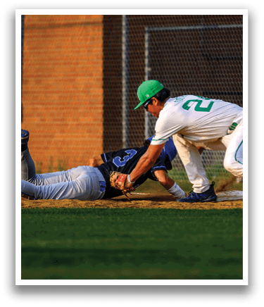 A baseball player slides into a base. Description generated by AI
