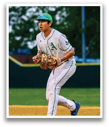 A baseball player wearing a green and white uniform. Description generated by AI