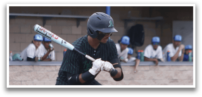 A baseball player is swinging a bat at a ball. Description generated by AI