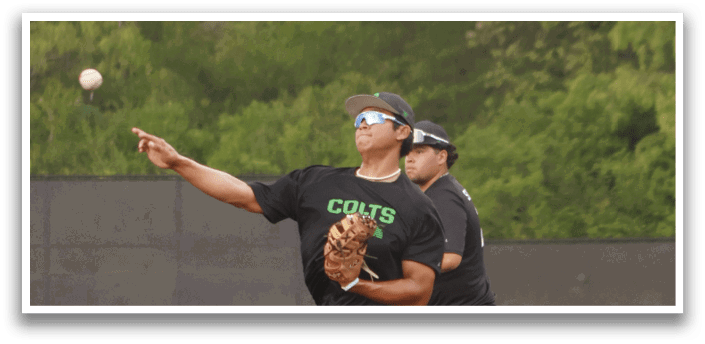 A baseball player catching a ball. Description generated by AI