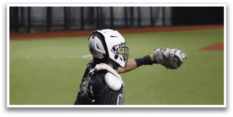A baseball player kneeling on the field with a catcher's mitt on his left hand. Description generated by AI