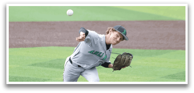 A baseball player in a grey uniform is pitching a ball. Description generated by AI