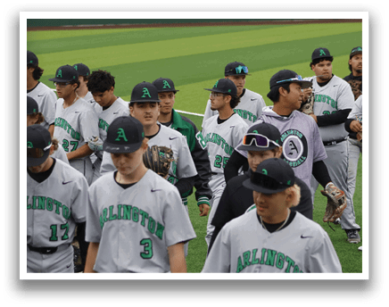 Baseball players wearing grey uniforms. Description generated by AI