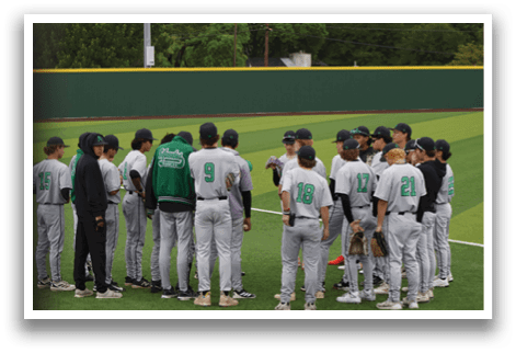 Baseball players wearing green and white uniforms. Description generated by AI