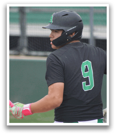 A baseball player wearing a black and green jersey. Description generated by AI