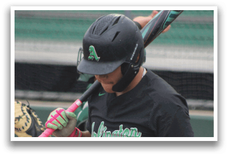 A baseball player wearing a black shirt with the word “Allegheny" on it. Description generated by AI
