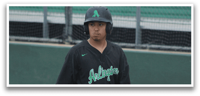 A baseball player holding a bat. Description generated by AI