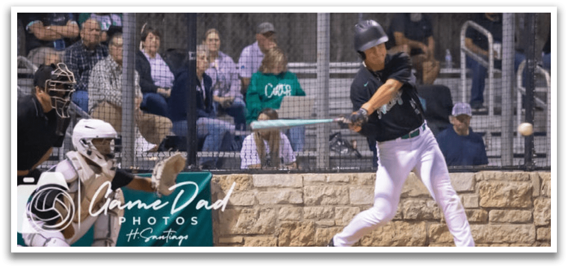 A baseball player is swinging a bat at a ball. Description generated by AI