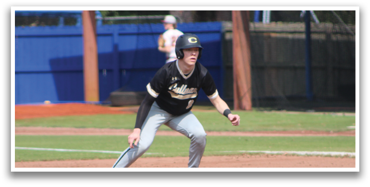 A baseball player in a black and white uniform is standing on the field, ready to catch a ball. AI generated content