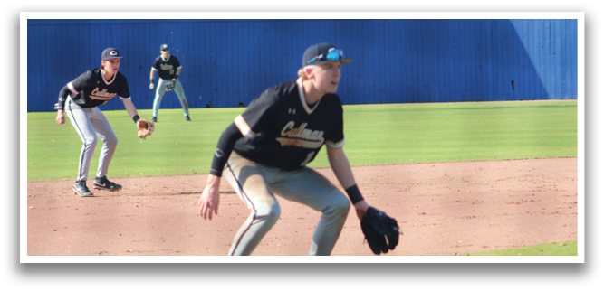 A baseball player is standing on the field wearing a black shirt and hat. AI generated content