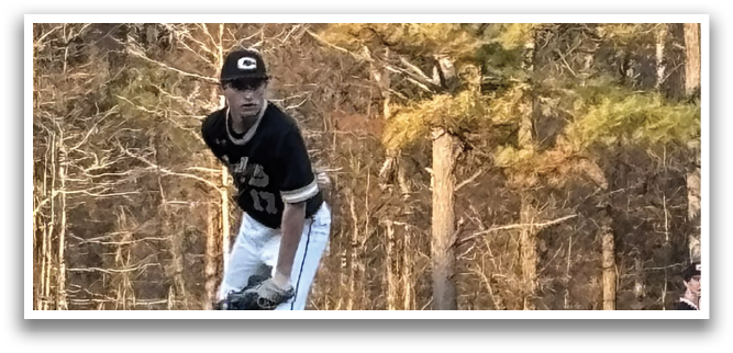 A baseball player in a black and gold uniform is on the mound, preparing to throw the ball. AI generated content