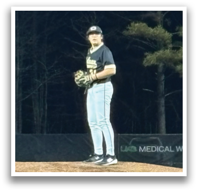 A baseball player is standing on a mound, wearing a black shirt and a baseball glove. AI generated content