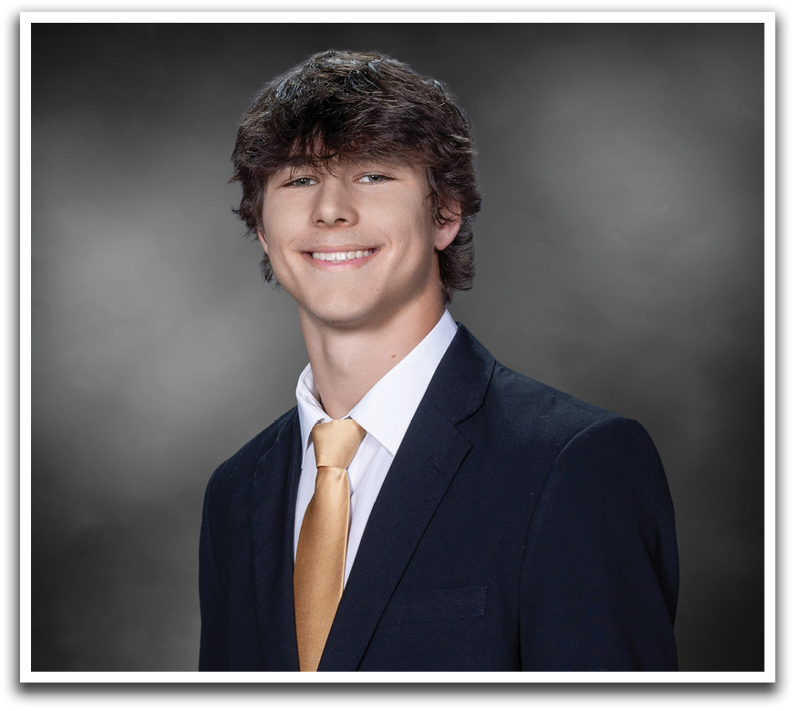 A young man wearing a suit and tie is smiling for the camera. AI generated content
