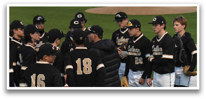 A group of baseball players wearing black and white uniforms are standing on a field. AI generated content