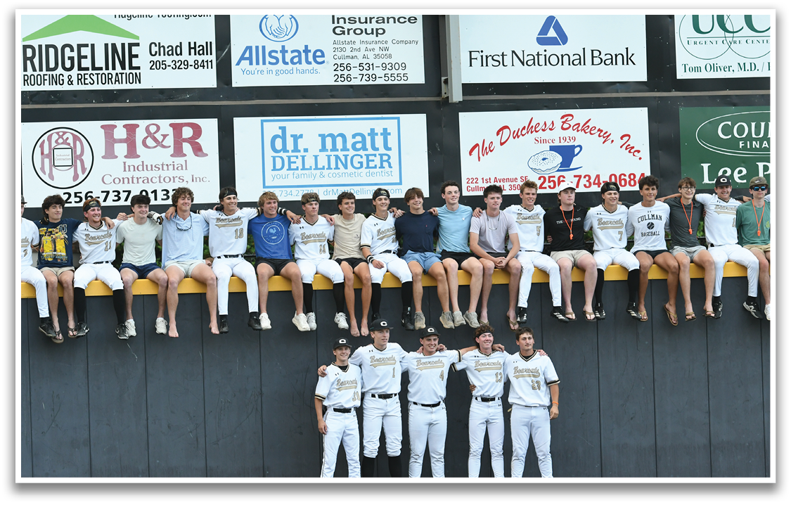 A group of young men wearing white uniforms. Description generated by AI