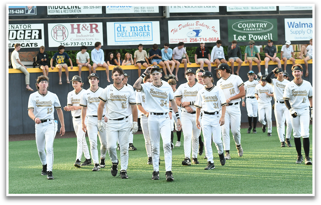 Baseball players walking on the field. Description generated by AI