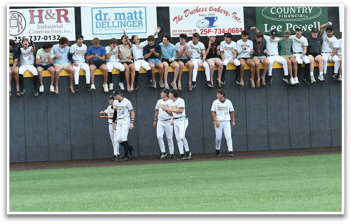A group of people are standing on a baseball field. Description generated by AI