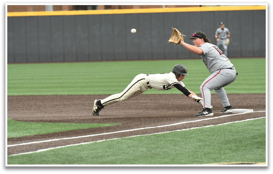 A baseball player sliding into a base. Description generated by AI