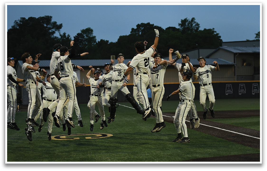 A group of baseball players celebrating on the field. Description generated by AI