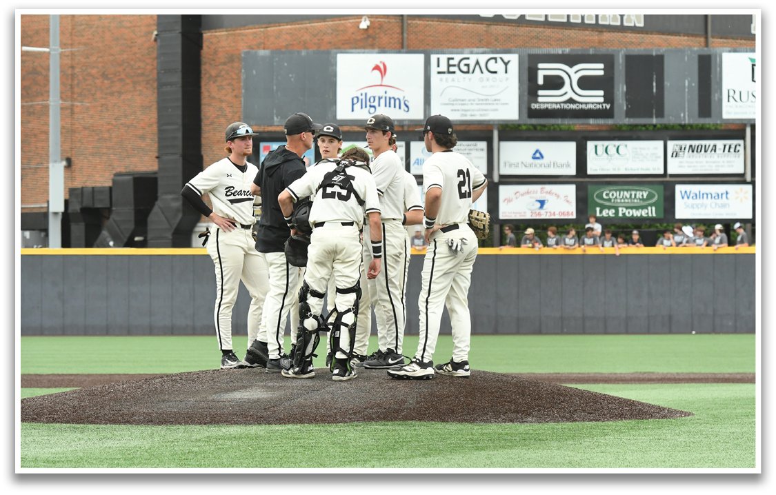 A group of baseball players on the field. Description generated by AI