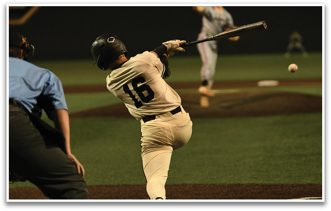 A baseball player is swinging a bat at a ball. Description generated by AI