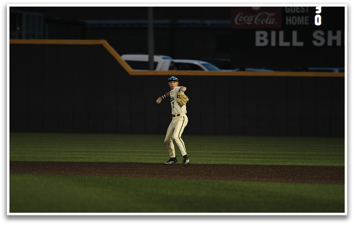 A baseball player is running on the field. Description generated by AI