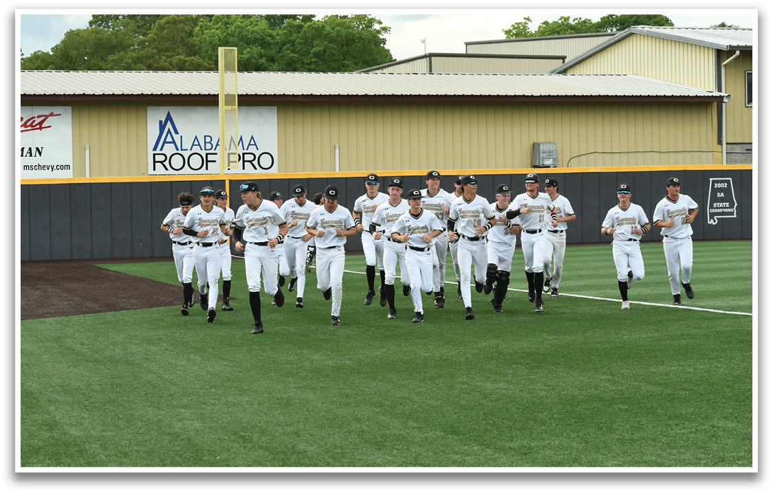 Baseball players walking on the field. Description generated by AI