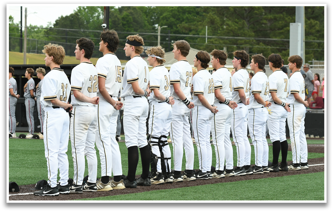 A group of baseball players in uniforms. Description generated by AI