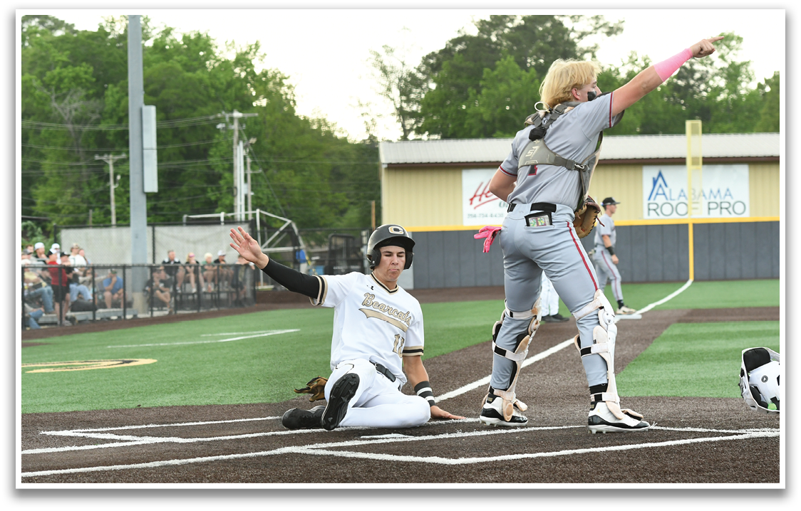 A baseball player is sliding into home plate. Description generated by AI