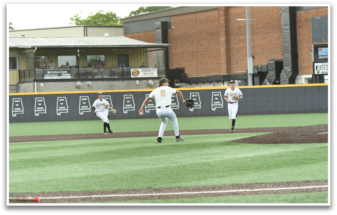 A baseball player is throwing a ball. Description generated by AI