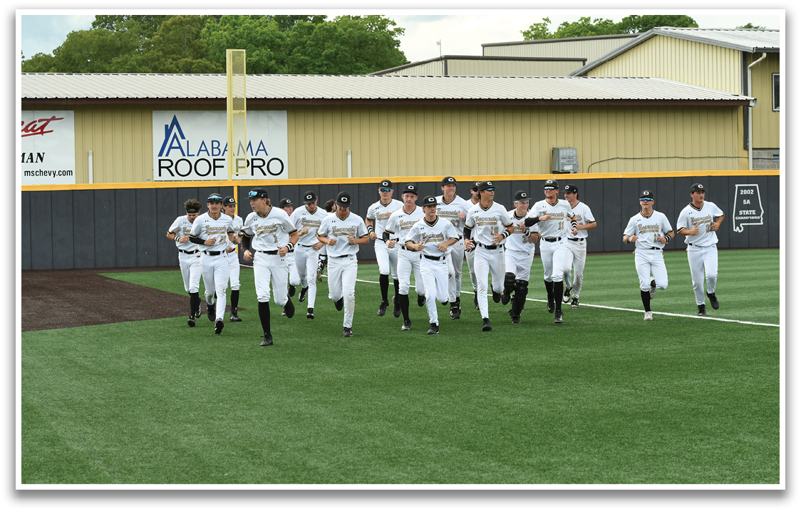 Baseball players walking on the field. Description generated by AI