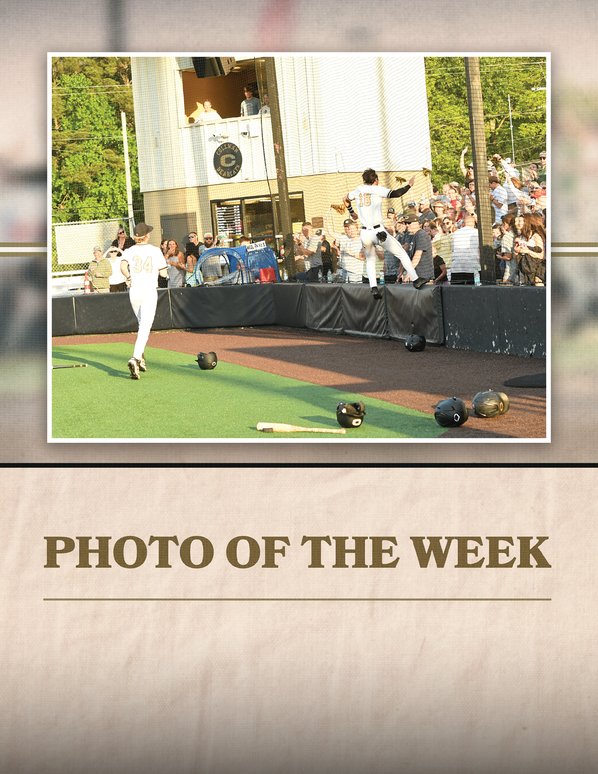 A baseball player is swinging a bat on a field. Description generated by AI