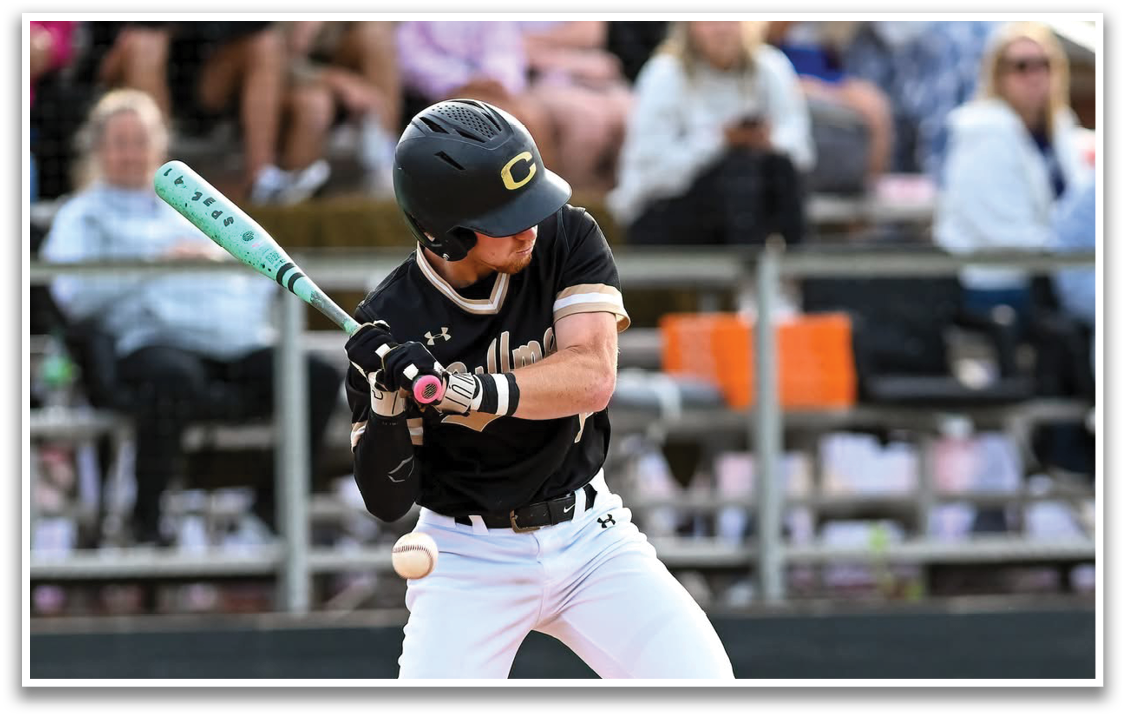 A baseball player is swinging a bat. Description generated by AI