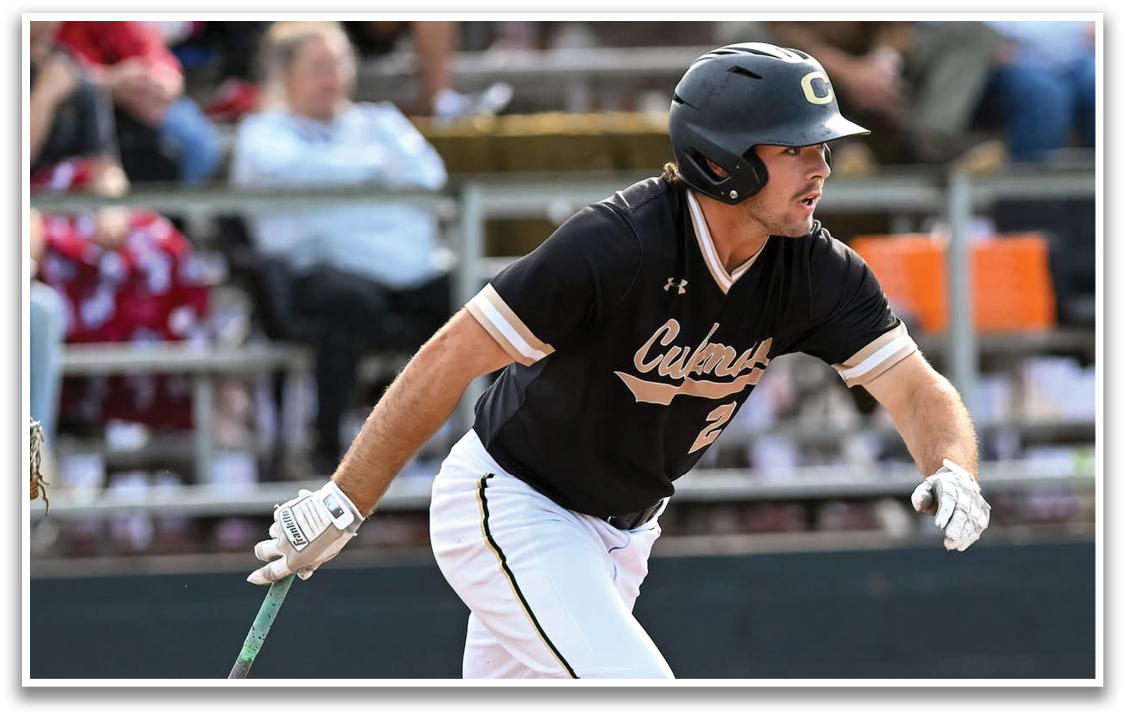 A baseball player in a black and gold uniform with the number 2 on his jersey. Description generated by AI