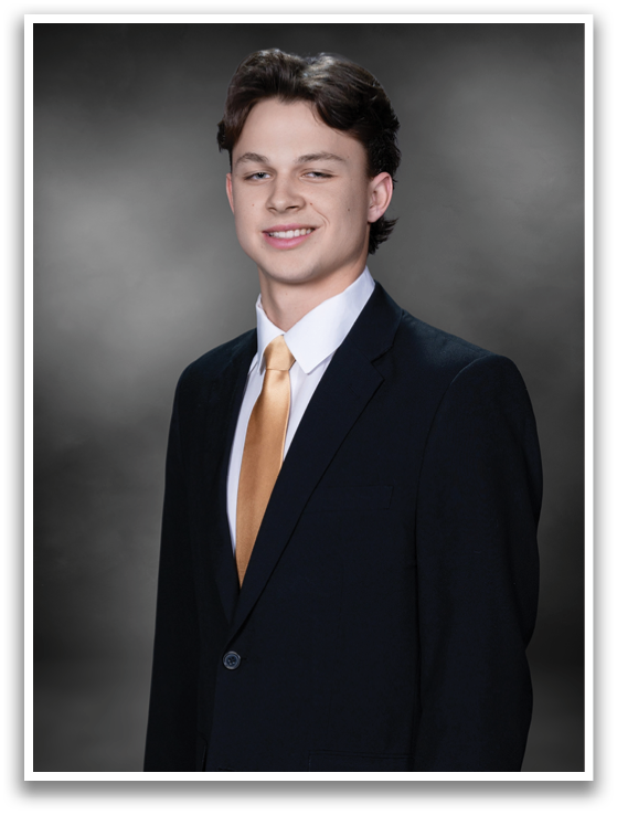 A young man wearing a suit and tie is smiling for the camera. AI generated content