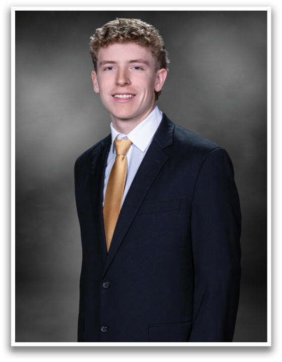 A young man wearing a suit and tie smiles for the camera. AI generated content