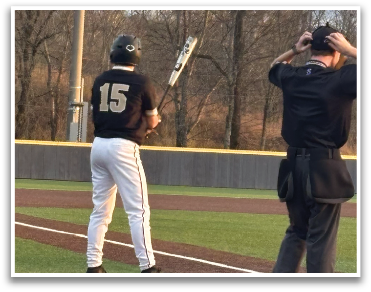 A baseball player is holding a bat and waiting for the pitch. AI generated content